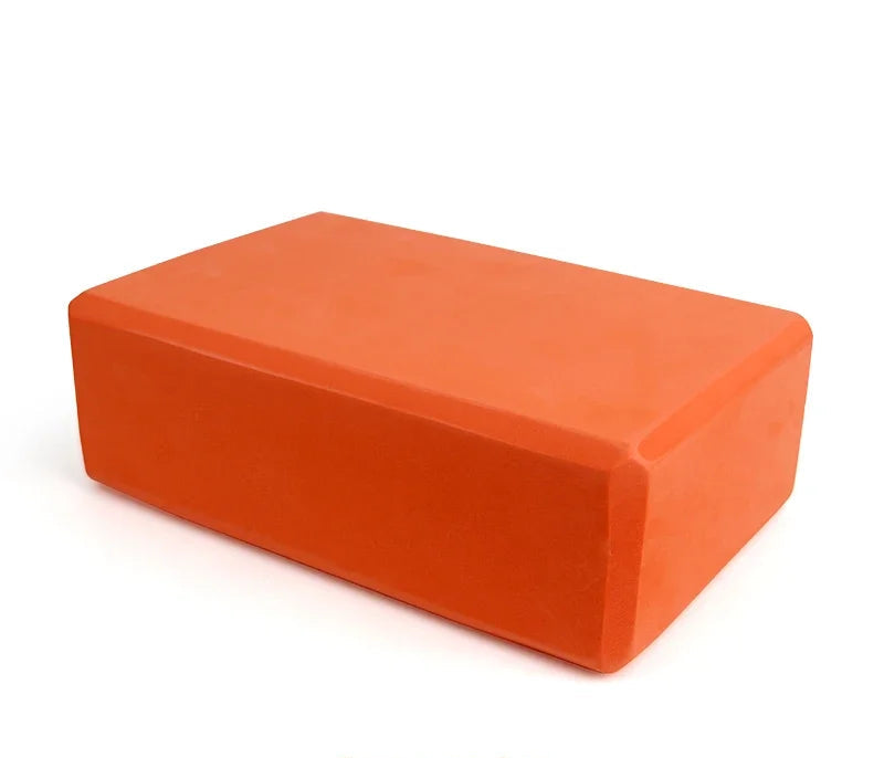 Lumo Yoga Block aus EVA-Schaum in Orange einzeln präsentiert