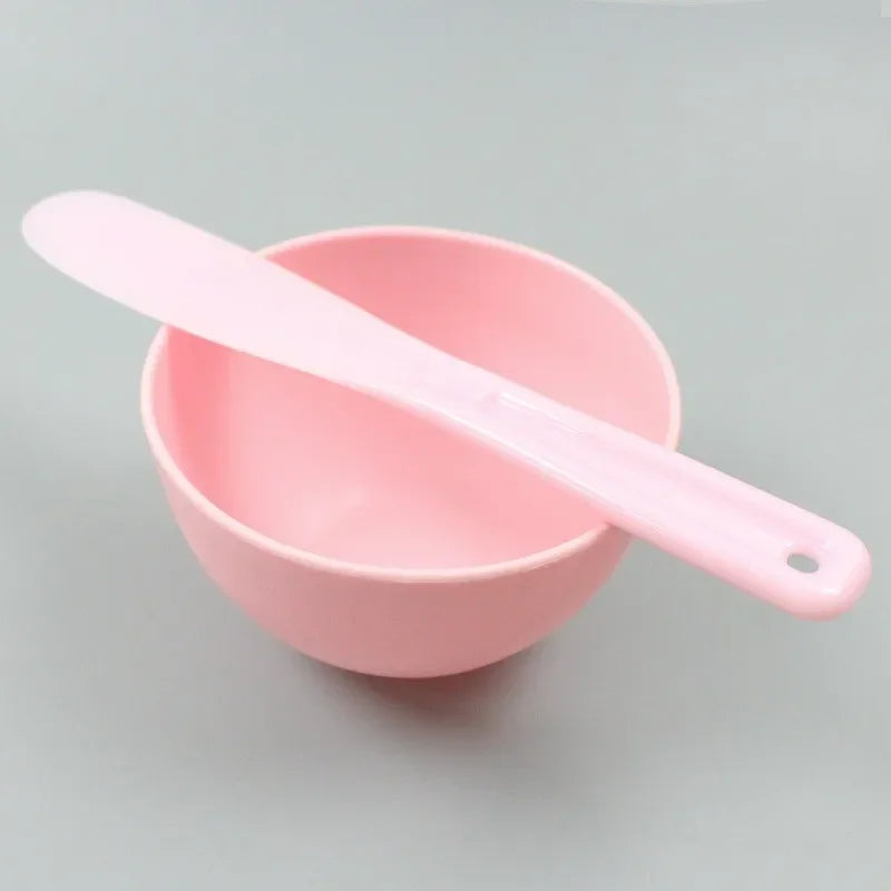 Melo Silikon Maskenschale mit Spatel in Pink einzeln liegend dargestellt